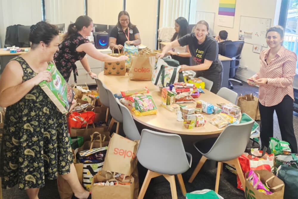 UnitingCare packing donations.