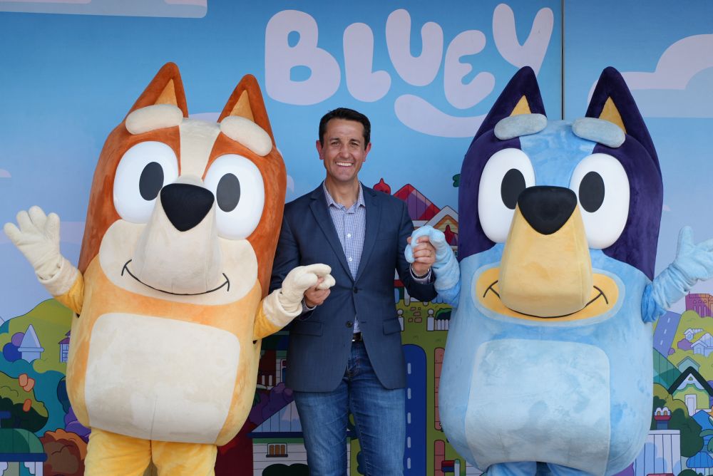 Premier with onstage with Bluey and Bingo at the first G’day Little Queenslanders event in Moreton Bay